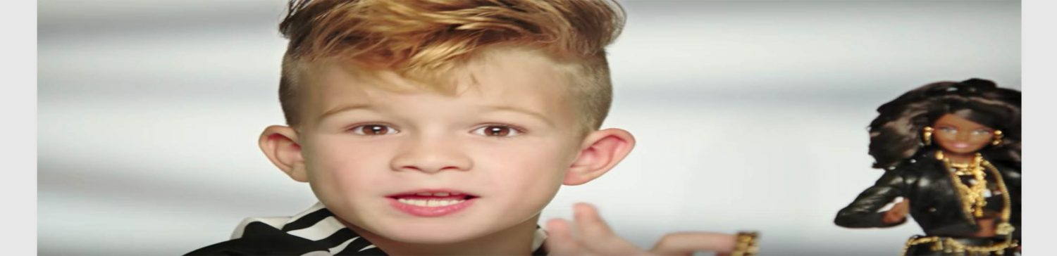 Barbie ad features a boy for the first time
