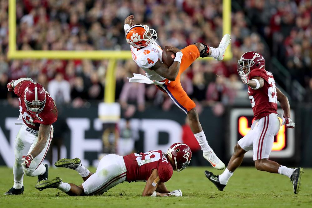 TAMPA, FL - JANUARY 09:  Quarterback Deshaun Watson #4 of the Clemson Tigers is tackled short of the first down by linebacker Reuben Foster #10 and defensive back Minkah Fitzpatrick #29 of the Alabama Crimson Tide during the third quarter of the 2017 College Football Playoff National Championship Game at Raymond James Stadium on January 9, 2017 in Tampa, Florida.  (Photo by Tom Pennington/Getty Images) ORG XMIT: 686857421 ORIG FILE ID: 631368290