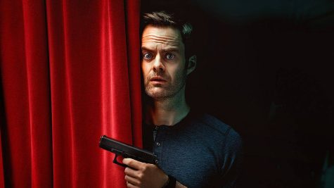 Promotional image for HBO series Barry. Pictured: Bill Hader as Barry, partially hidden behind a curtain holding a pistol