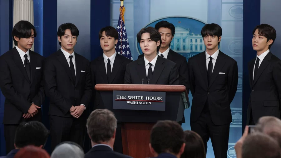 BTS announcing their mandatory military service   at the white house.   