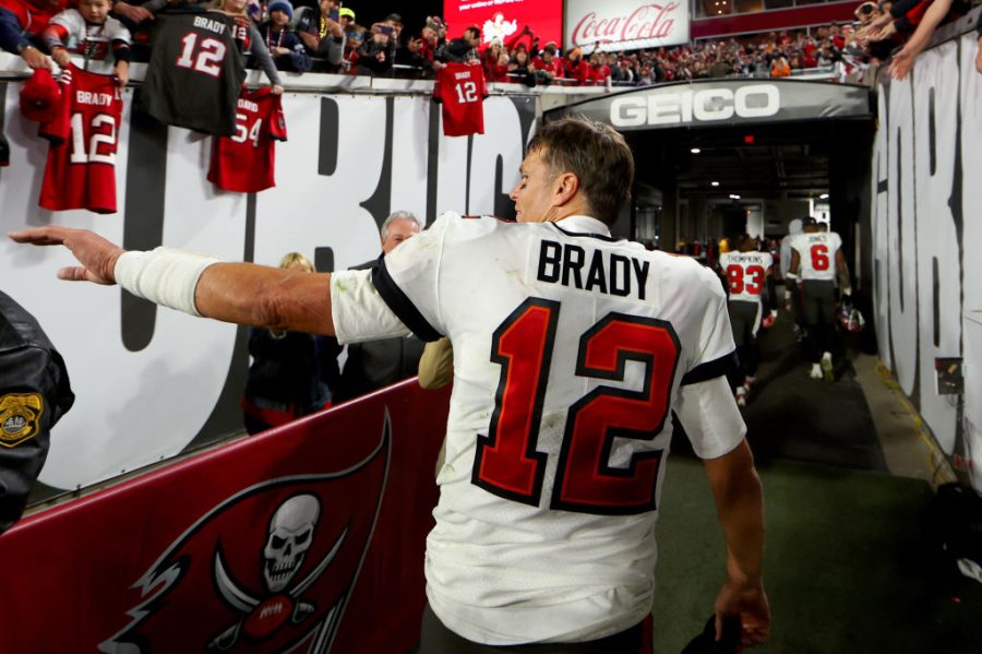 TAMPA, FLORIDA - JANUARY 16: Tom Brady #12 of the Tampa Bay Buccaneers walks off the field after losing to the Dallas Cowboys 31-14 in the NFC Wild Card playoff game at Raymond James Stadium on January 16, 2023 in Tampa, Florida. (Photo by Mike Ehrmann/Getty Images)