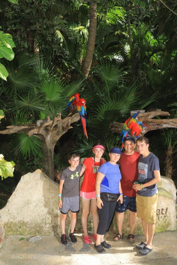 Stanciu and his family pictured at the entrance of Xcaret Park in Playa Del Carmen, Mexico (Aiden positioned far right)