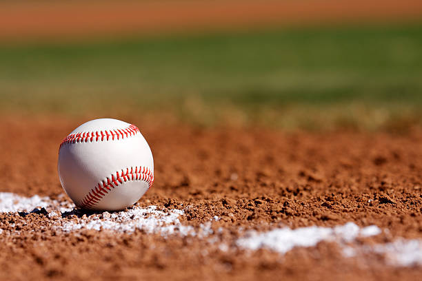 A baseball ball lying on a baseball field. (iStock Photo)