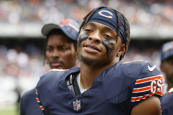 Chicago Bears quarterback Justin Fields (1) walks off the field after the first half of an NFL preseason football game against the Buffalo Bills, Saturday, Aug. 26, 2023, in Chicago. (AP Photo/Kamil Krzaczynski)