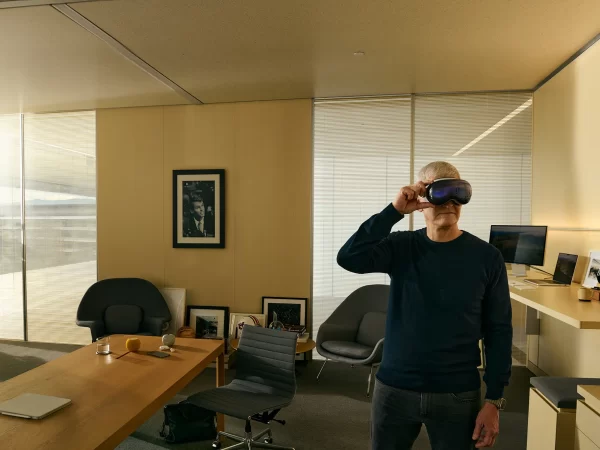 Apple CEO Tim Cook pictured wearing the Apple Vision Pro in his California office