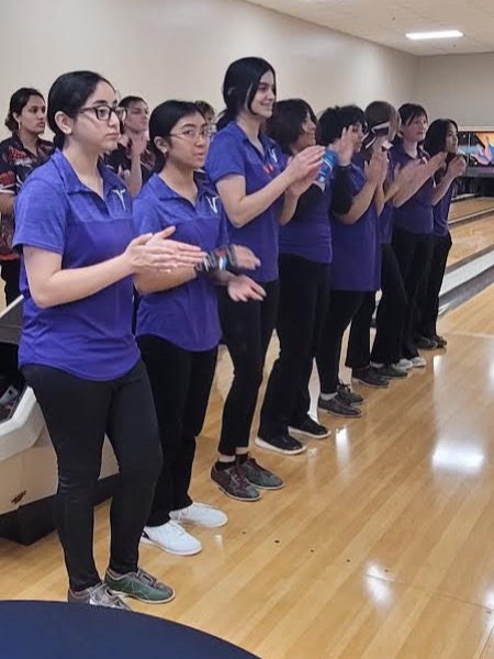 Girls Bowling Varsity line up before the Pledge of Allegiance at Regionals