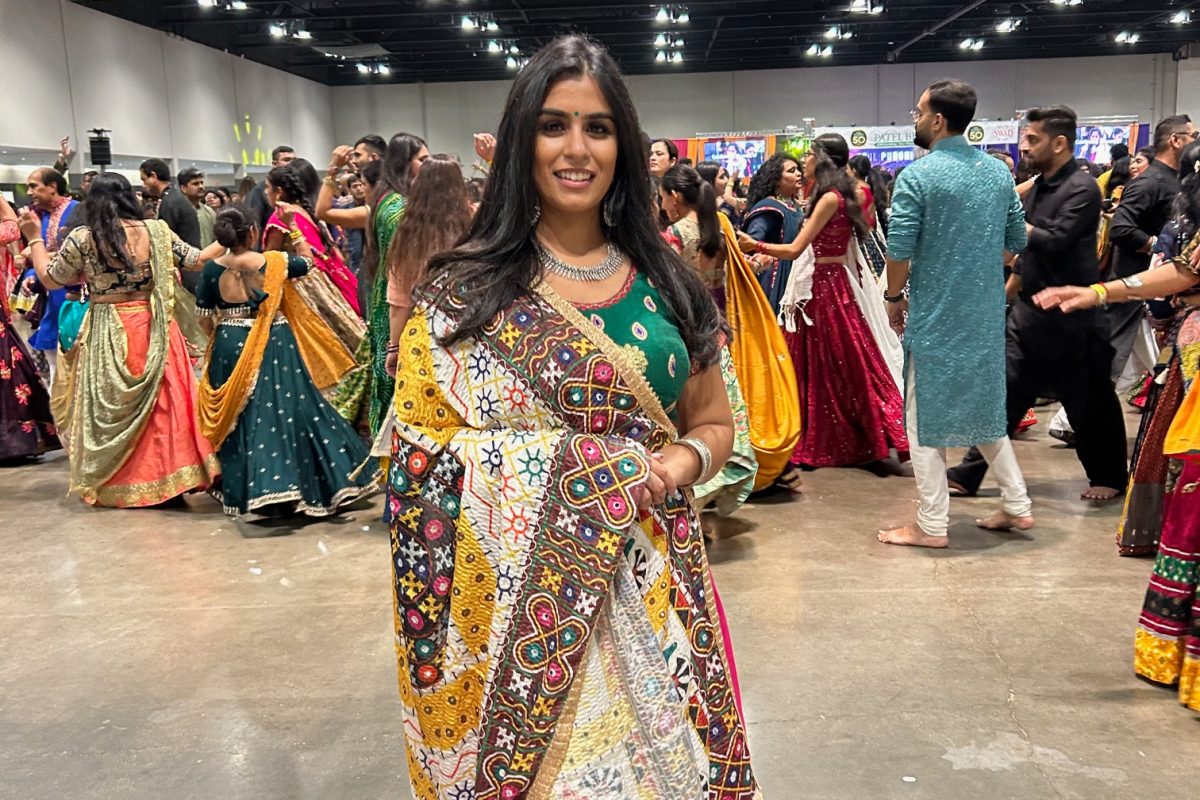 Bharatia is seen wearing a chaniya choli—a traditional Indian outfit—during a garba gathering in celebration of Navratri, a festival honoring the Hindu godesses. 