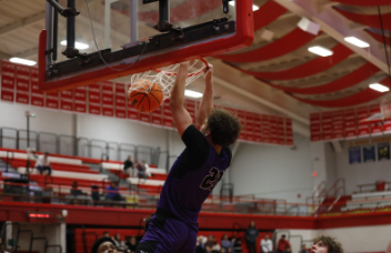 Hunter Gawron throwing it down against Lane Tech at the Hinsdale Central Holiday Classic 