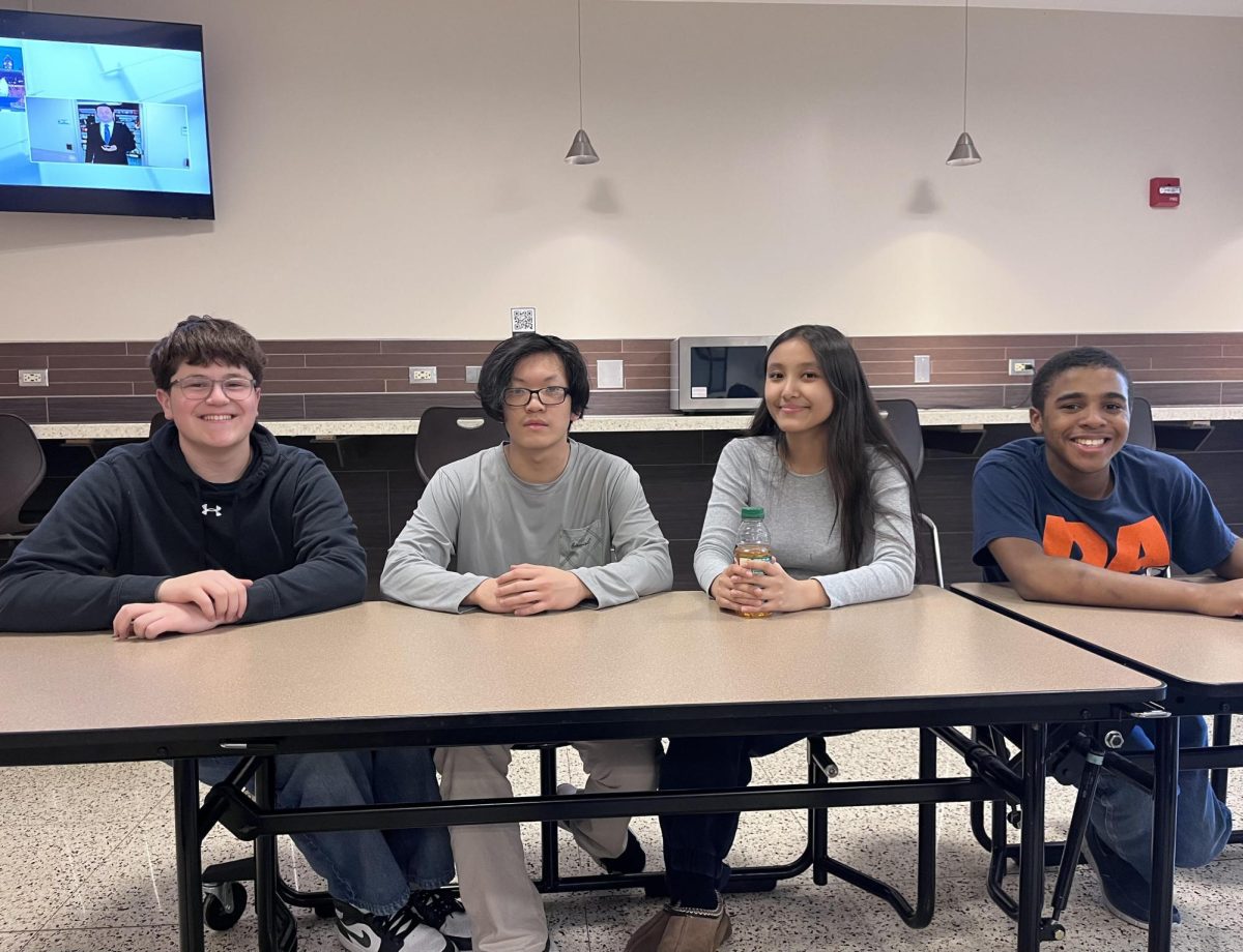 Four of the members of Niles North's Tutoring Club.